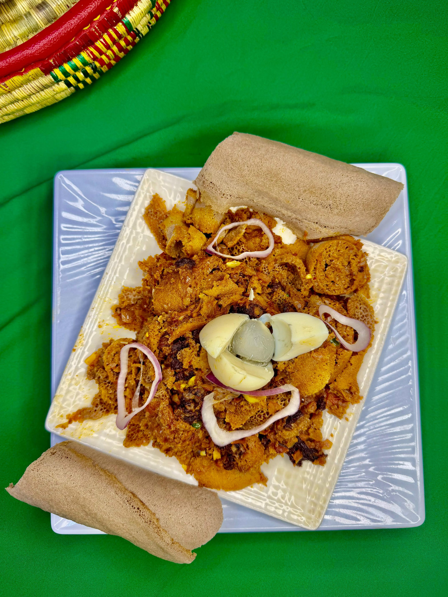 Ethiopian firfir, shredded injera in a spiced berbere sauce