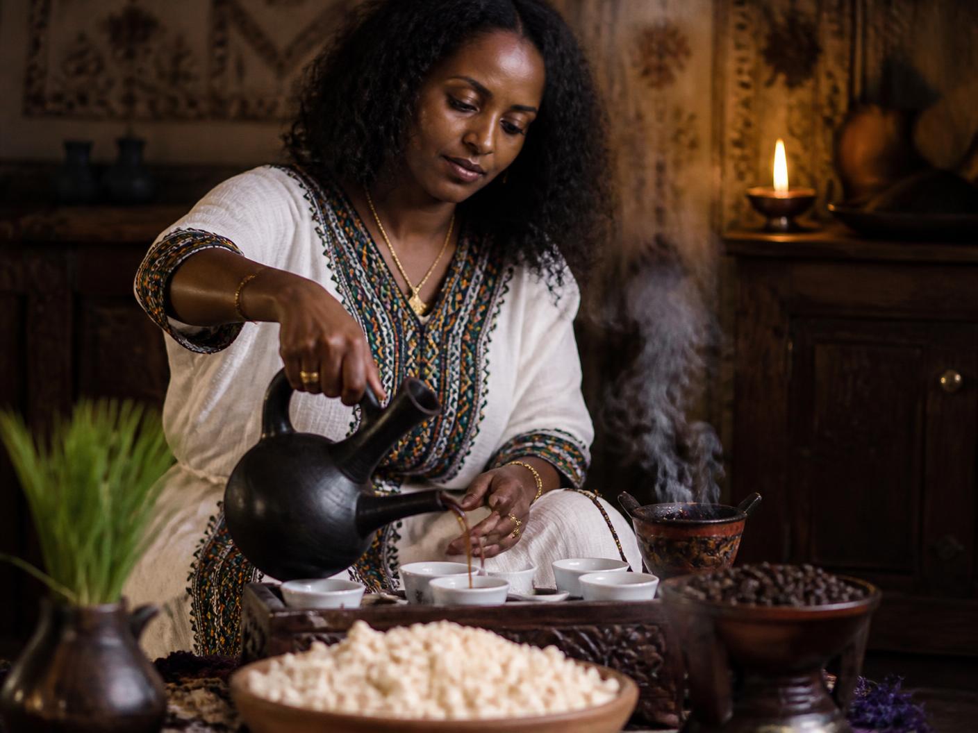 Traditional Ethiopian coffee ceremony with a jebena and small cups