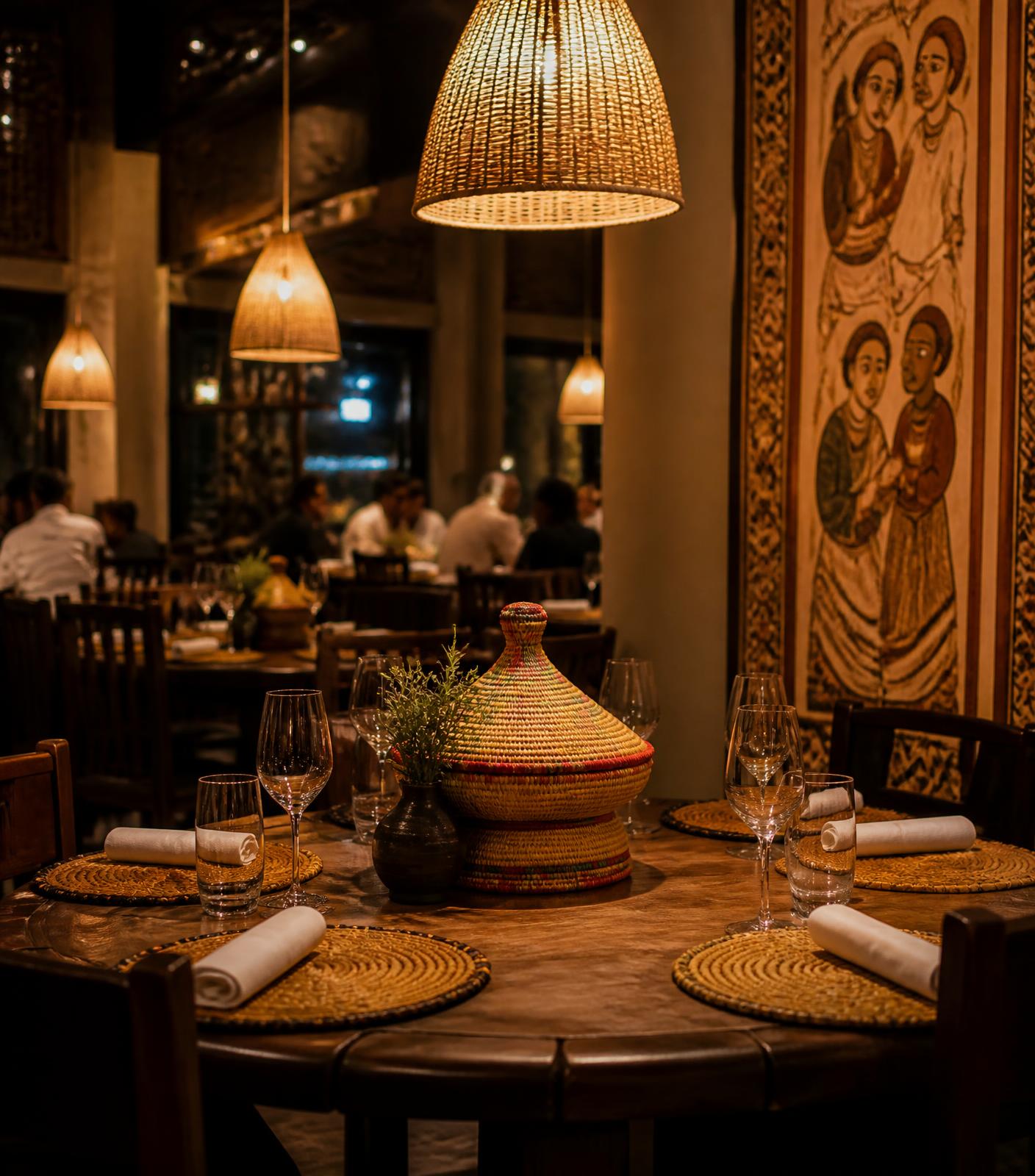 Warm Ethiopian restaurant interior with woven baskets and golden lighting